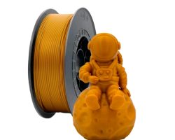 Bobina de filamento PLA Oro de 1.75mm y 1kg para impresora 3D, material termoplástico ecológico de gran rigidez y acabado metálico dorado uniforme.